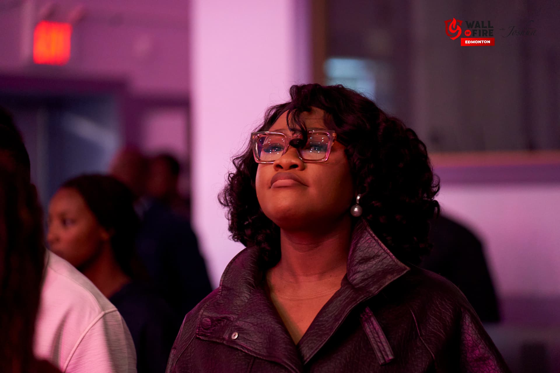 A woman looking up in worship